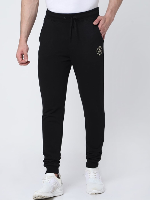 

MERCHANT MARINE Men Black Solid Training & Gym Joggers