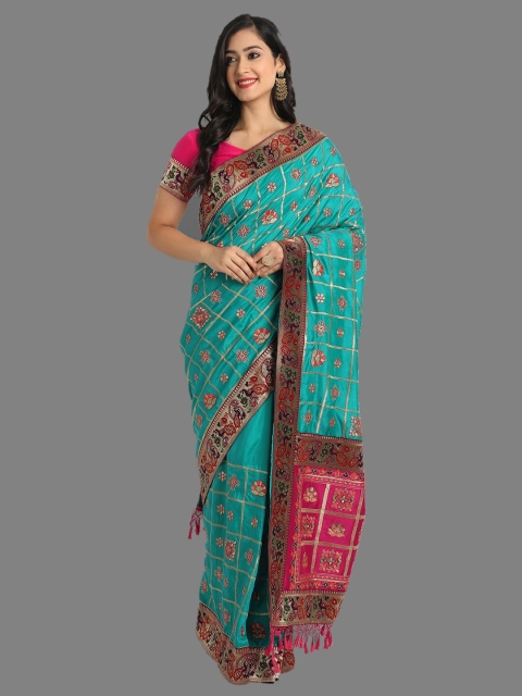 

Ekta Textiles Sea Green & Magenta Ethnic Motifs Embroidered Silk Blend Patola Saree