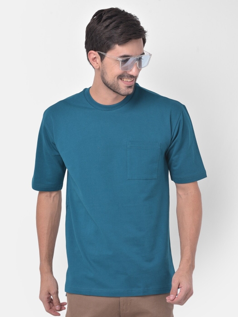 

Melangebox Men Blue Solid Cotton T-shirt