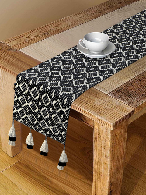 

Mezposh Black & White Self-Design Cotton Acrylic 6 Seater Table Runner With Tassels