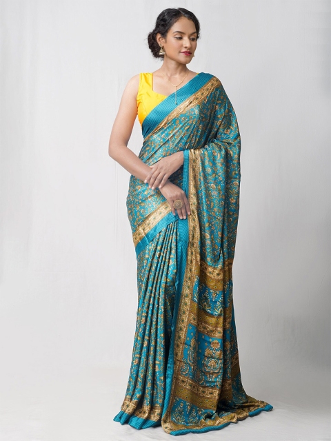 

Unnati Silks Sea Green & Yellow Ethnic Motifs Printed Patola Saree