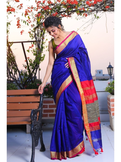 

Charukriti Blue & Red Woven Design Zari Saree