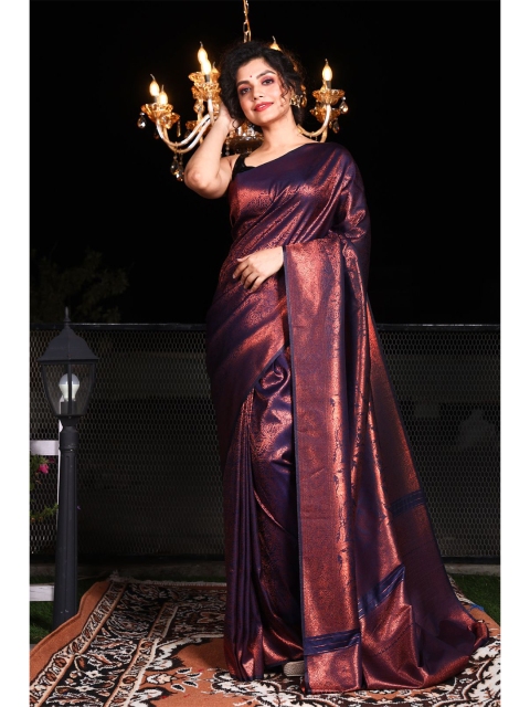 

Charukriti Black & Copper-Toned Ethnic Motifs Zari Brocade Saree