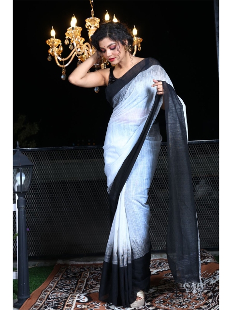 

Charukriti White & Black Pure Cotton Saree