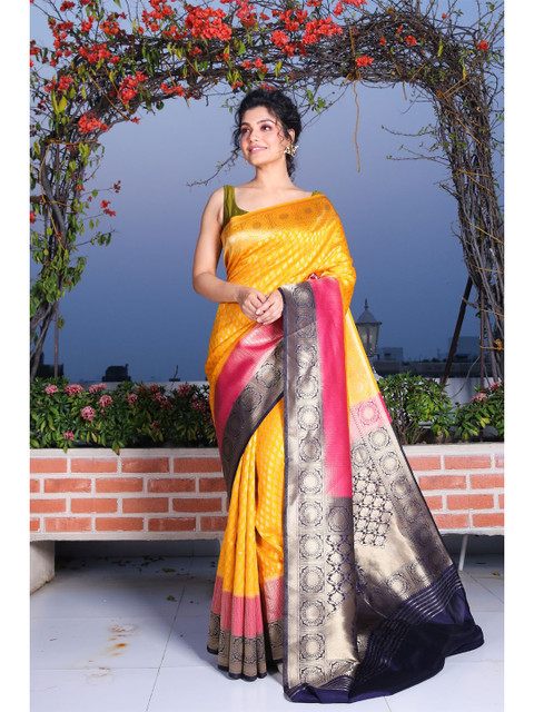 

Charukriti Yellow & Navy Blue Ethnic Motifs Zari Brocade Silk Saree