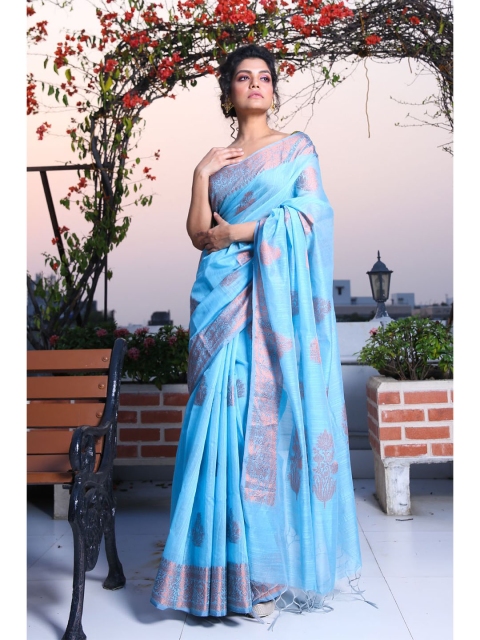 

Charukriti Blue & Copper-Toned Ethnic Motifs Zari Silk Blend Saree