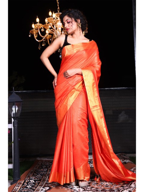 

Charukriti Rust & Gold-Toned Silk Blend Saree