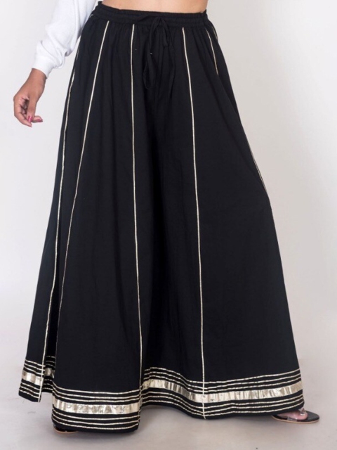 

Swasti Women Black & Gold-Toned Flared Lace Ethnic Palazzos