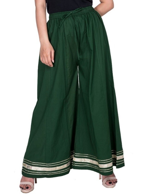 

Swasti Women Green & Gold-Toned Hem Design Flared Ethnic Cotton Palazzos