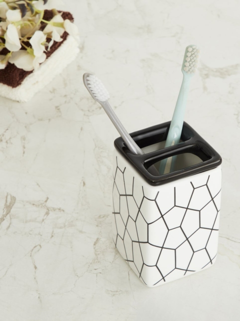

Home Centre White & Black Printed Ceramic Tooth Brush Holder