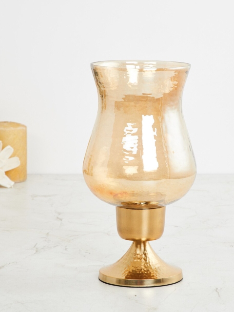 

Home Centre Gold-Toned Solid Glass Candle Holder