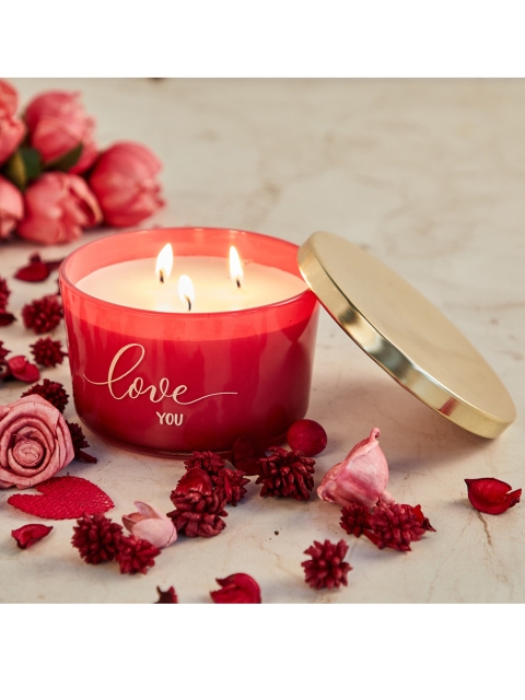 

Home Centre Red Triple Wick Scented Decal Glass Candle With Metal Lid