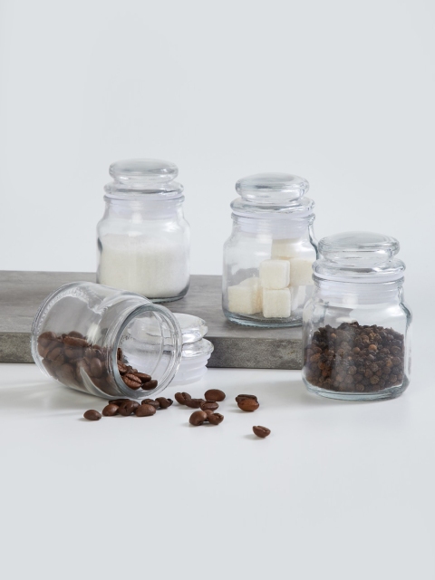 

Home Centre Set Of 4 Transparent Glass Jars With Lids