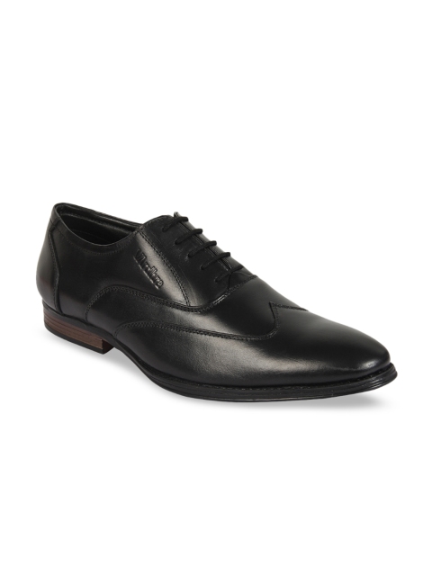 

Vardhra Men Black Solid Leather Formal Oxfords
