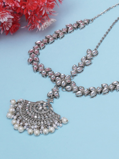 

KARATCART Women Silver-Plated & White Kundan-Studded Peacock Shaped Head Jewellery