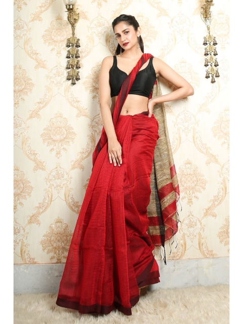 

Arhi Red & Beige Solid Cotton Blend Saree