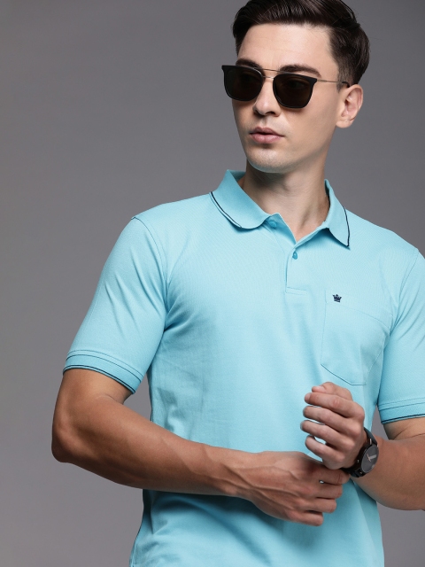 

Louis Philippe Men Sea Blue Solid Polo Collar Casual T-shirt