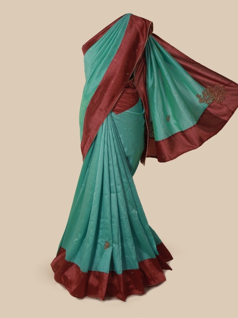 

Pothys Blue & Maroon Embellished Saree