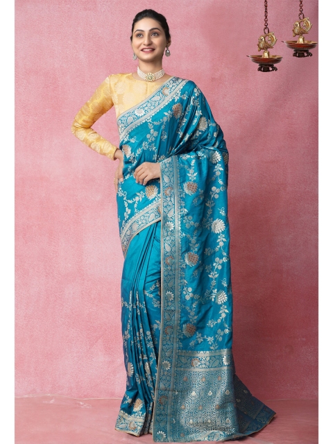 

Unnati Silks Blue Floral Zari Silk Blend Banarasi Saree