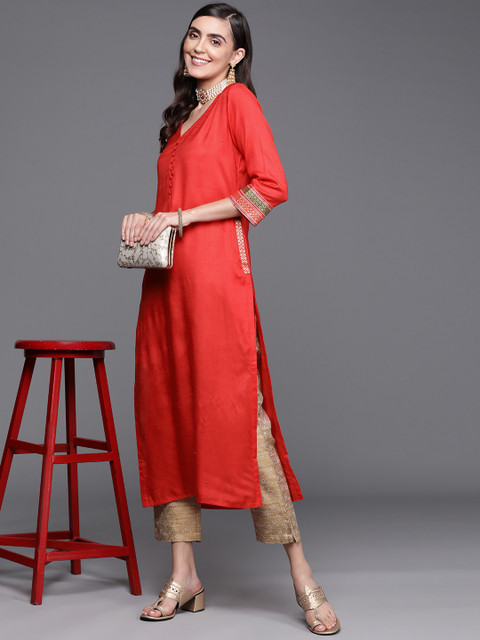 

PINKSKY Women Coral Kurta with Trousers