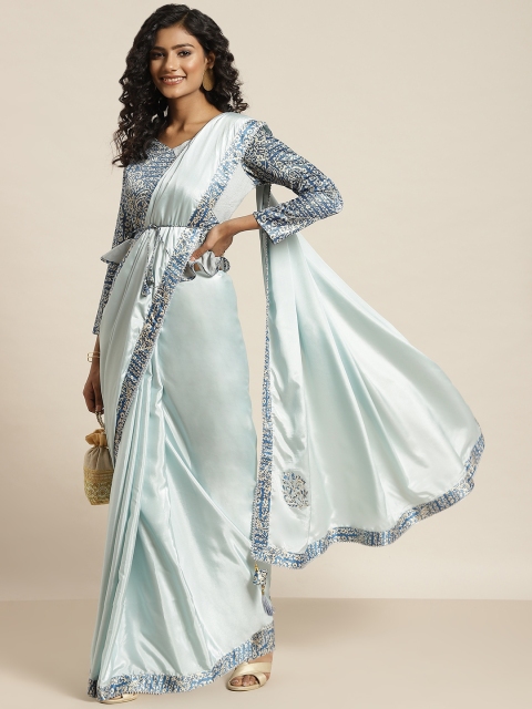 

Sangria Blue Solid Printed Border Saree
