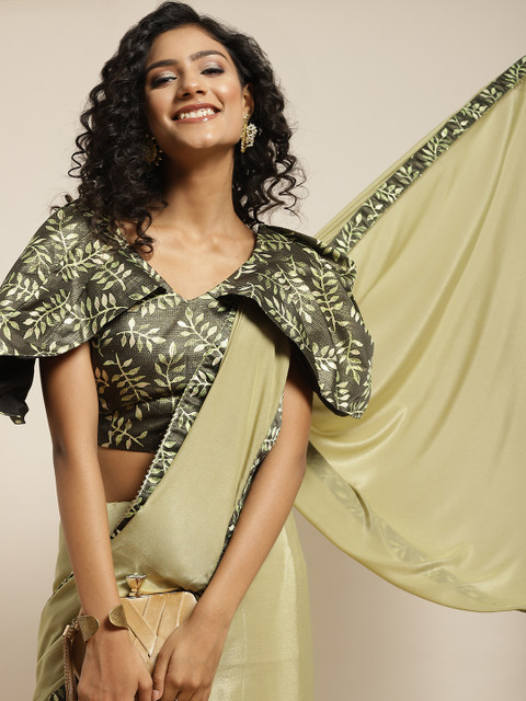 

Sangria Green Solid Printed Border Saree