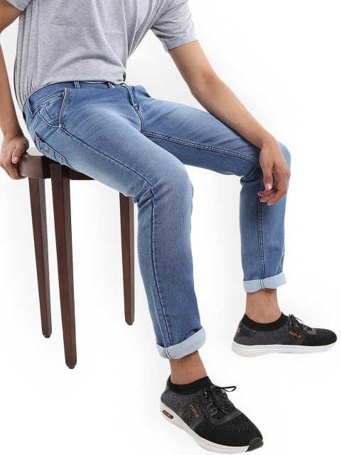 

V-Mart Men Blue Classic Slim Fit Mildly Distressed Light Fade Jeans