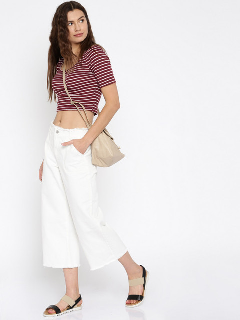 

Vero Moda Women White Boyfriend Fit Mid Rise Clean Look Flared Jeans