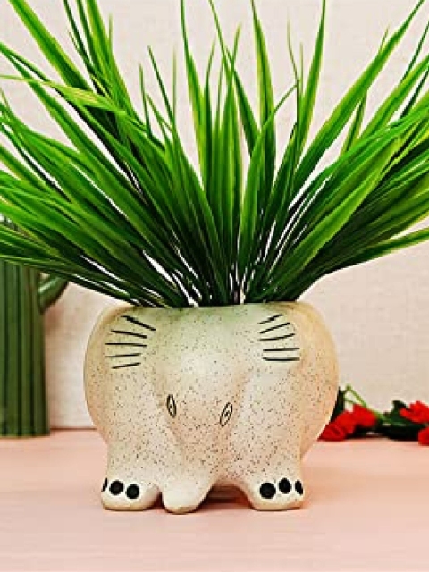 

Leafy Tales Off White Ceramic Solid Planter