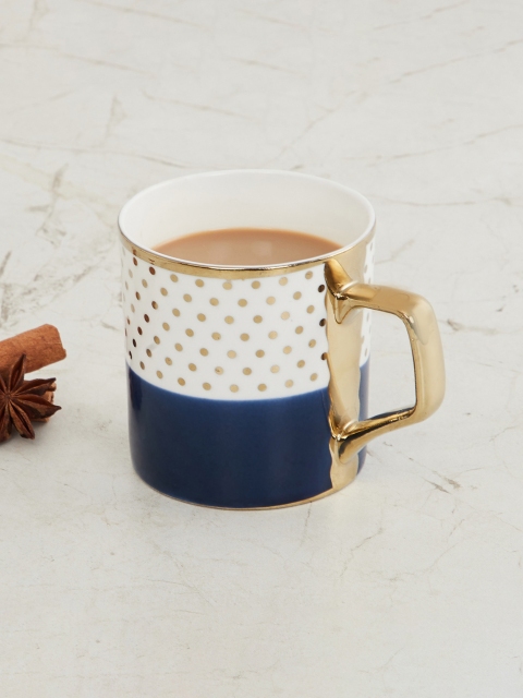 

Home Centre Blue & White Printed Bone China Glossy Mugs Set of Cups and Mugs