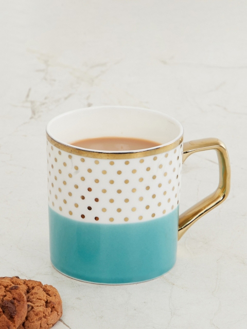 

Home Centre Blue & White Printed Bone China Matte Mugs Set of Cups and Mugs