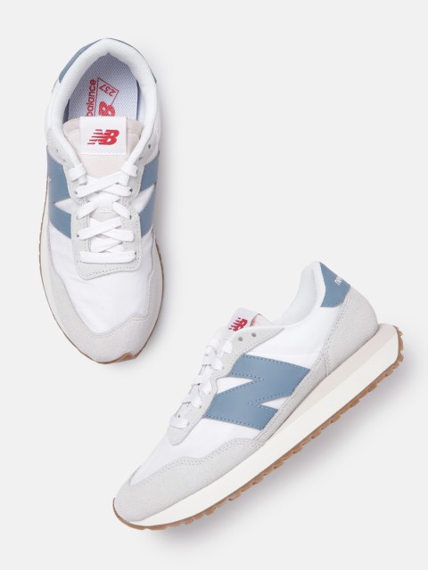 

New Balance Men White Solid Suede Sneakers