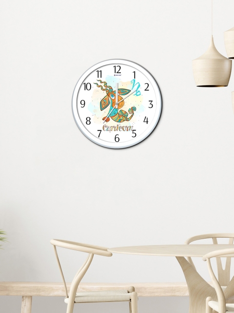 

WENS White & Orange Capricorn Printed Contemporary Wall Clock