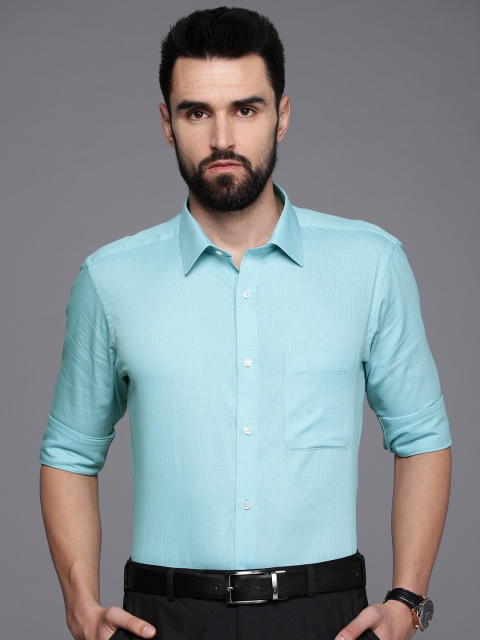 

Raymond Men Sea Blue Self Design Slim Fit Pure Cotton Formal Shirt
