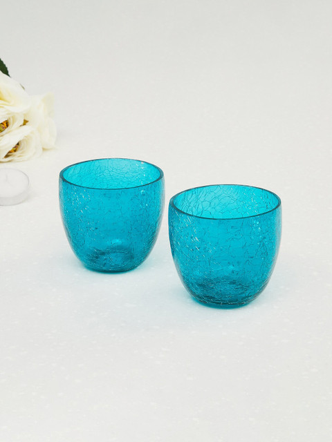 

Home Centre Set Of 2 Blue Textured Round Candle Holders