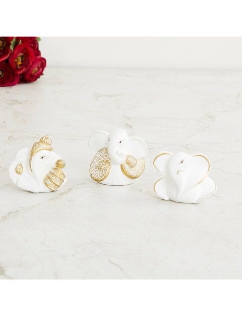 

Home Centre Set Of 3 White & Gold toned Printed Ganesha Figurine