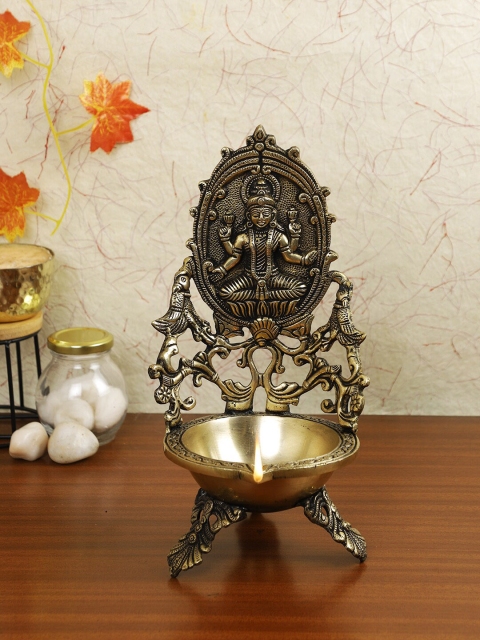 

Imli Street Gold-Toned Brass Laxmi Lamp Diya With 3 Legs