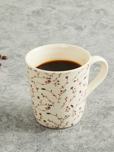 

Home Centre Beige & Maroon Floral Printed Stoneware Glossy Cup