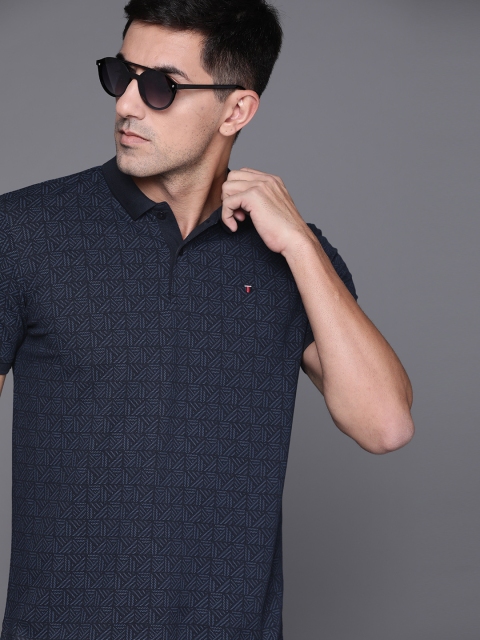 

Louis Philippe Sport Men Navy Blue Striped Polo Collar T-shirt