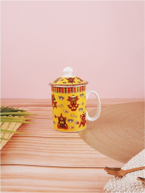 

THE WHITE INK DECOR Yellow & Red Printed Ceramic Glossy Mug with Lid