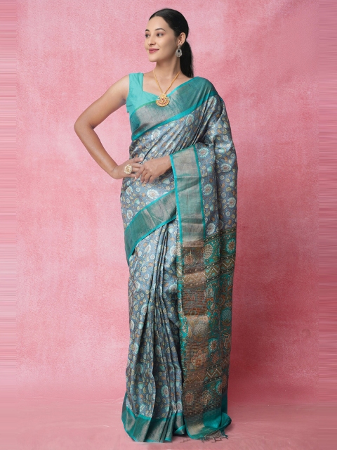 

Unnati Silks Grey & Turquoise Blue Ethnic Motifs Printed Zari Pure Silk Tussar Saree