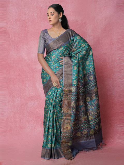 

Unnati Silks Green Ethnic Motifs Zari Pure Silk Tussar Saree