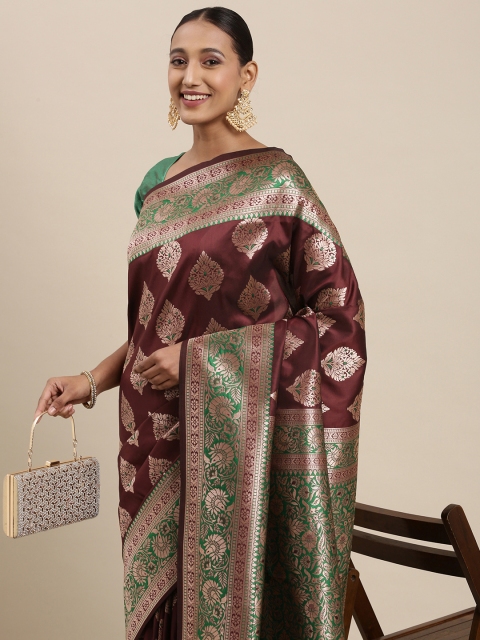 

Mitera Maroon & Gold Woven Design Zari Silk Blend Celebrity Banarasi Saree