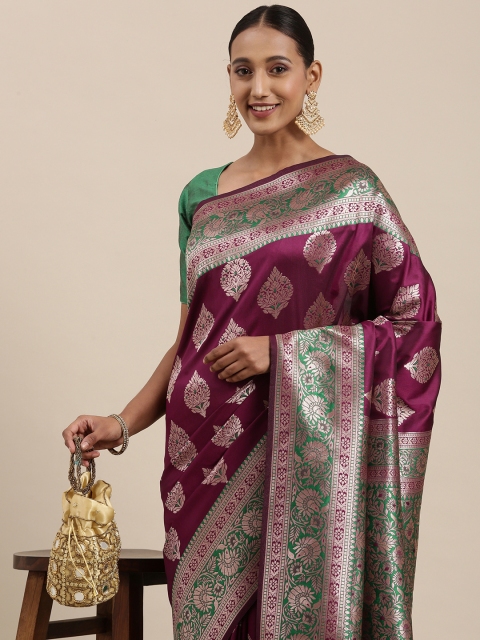 

Mitera Magenta & Gold Ethnic Motifs Zari Silk Blend Celebrity Banarasi Saree