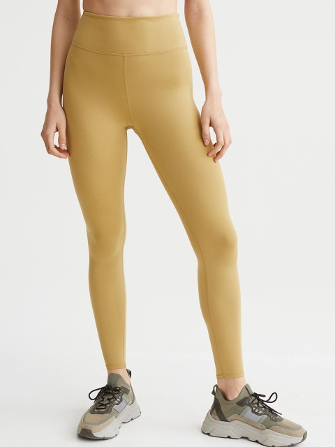 

H&M Women Yellow Solid Rapid Dry Super Soft Sports Tights