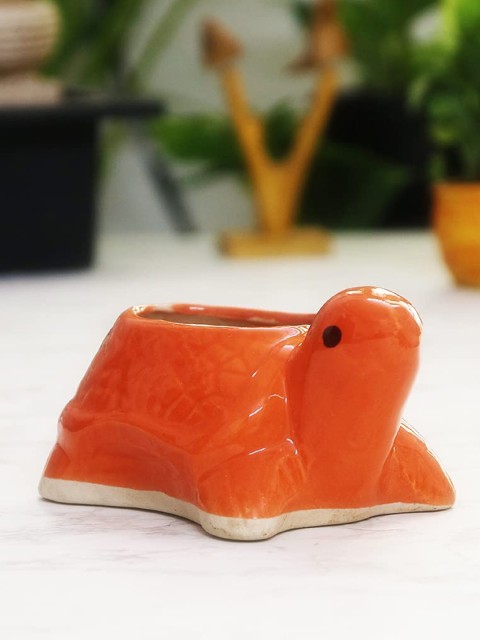 

Leafy Tales Orange Turtle Shape Ceramic Planter