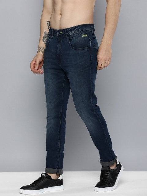 

Flying Machine Men Blue Jogger Fit Light Fade Printed Stretchable Jeans