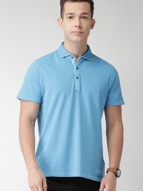 

Tommy Hilfiger Men Blue Solid Polo T-shirt
