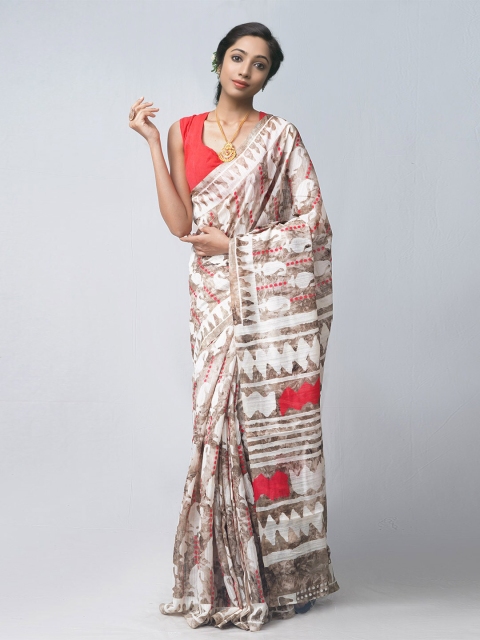 

Unnati Silks Multicoloured Ethnic Motifs Printed Silk Cotton Patola Saree, Multi