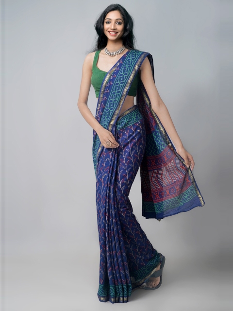 

Unnati Silks Navy Blue & Green Floral Patola Saree